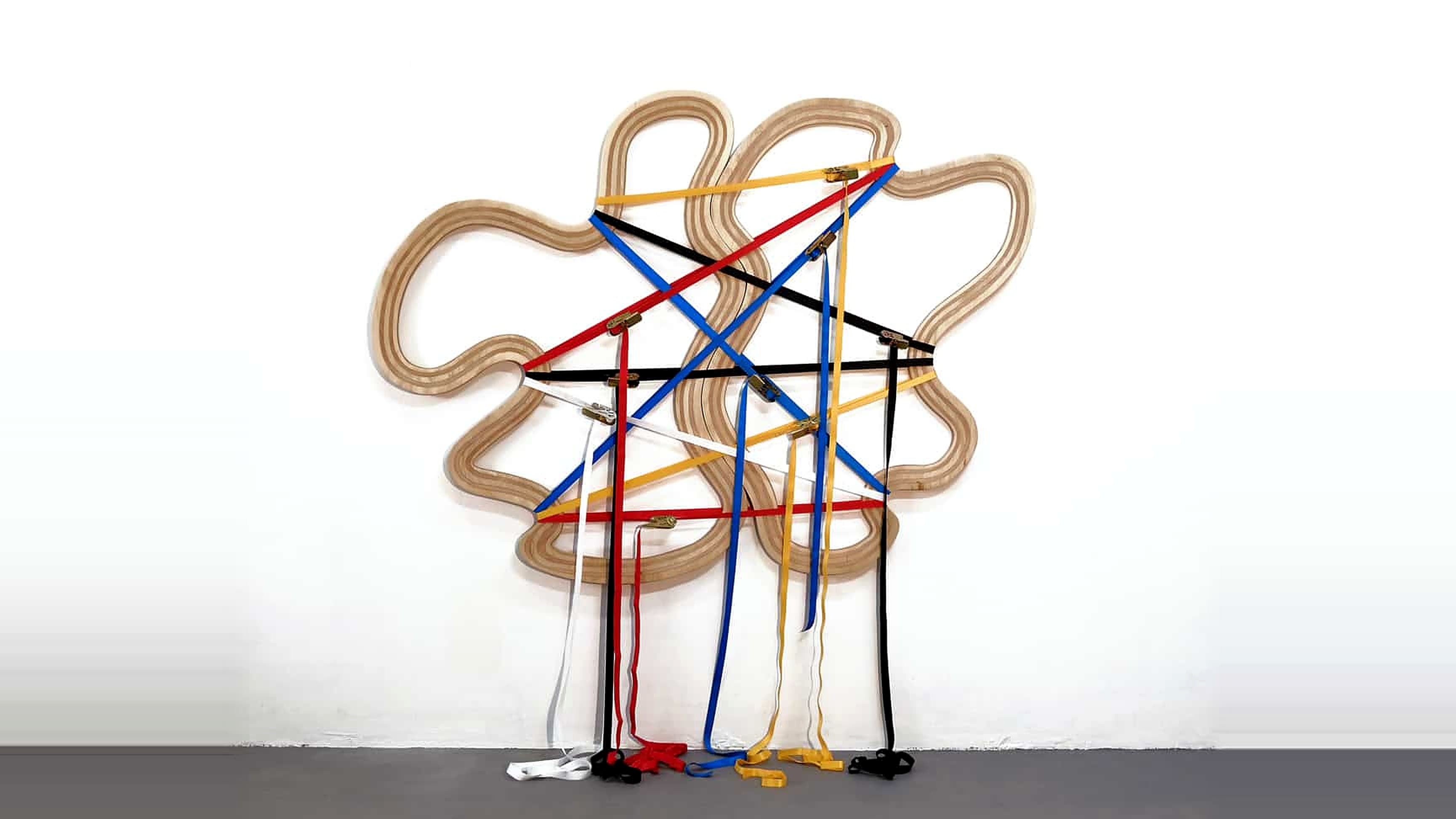 OX — Le Couple, 2017. Wood and straps installation at Open Walls Gallery Berlin.